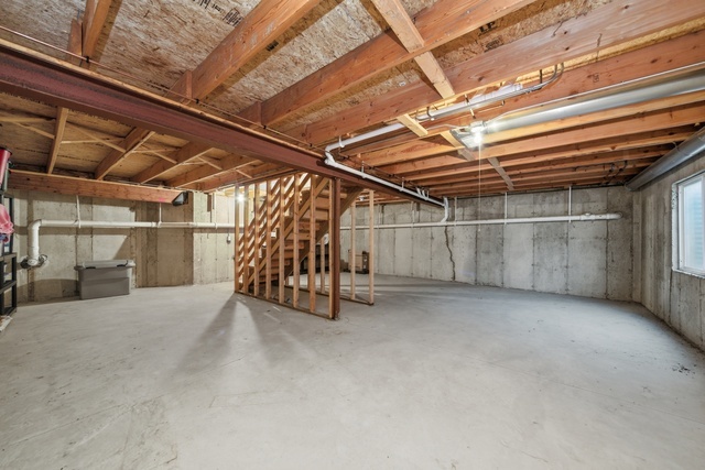 1758 Edith Lane Aurora, IL 60504 - Photo 22 of 28 a view of empty room with wooden roof