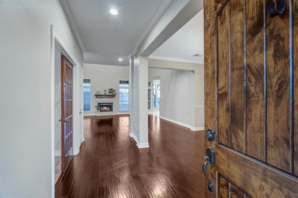 1810 Longbranch Road Waxahachie, TX 76065 - Photo 13 of 39 a view of kitchen with livingroom and hardwood floor