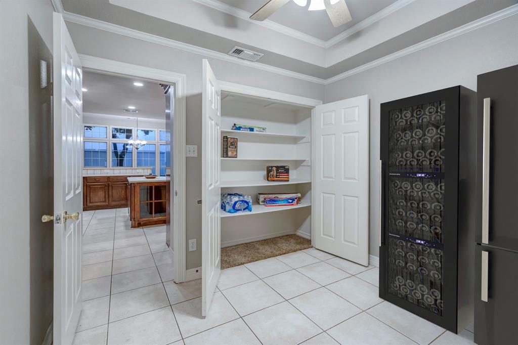 1810 Longbranch Road Waxahachie, TX 76065 - Photo 21 of 39 a view of kitchen with refrigerator and window