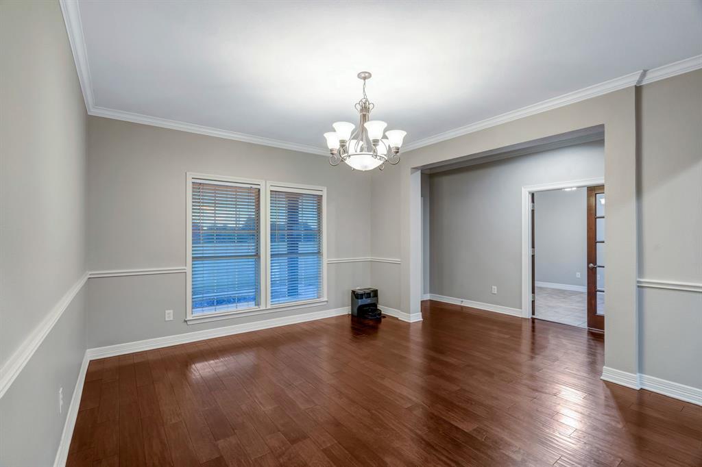 1810 Longbranch Road Waxahachie, TX 76065 - Photo 22 of 39 a view of empty room with wooden floor and fan