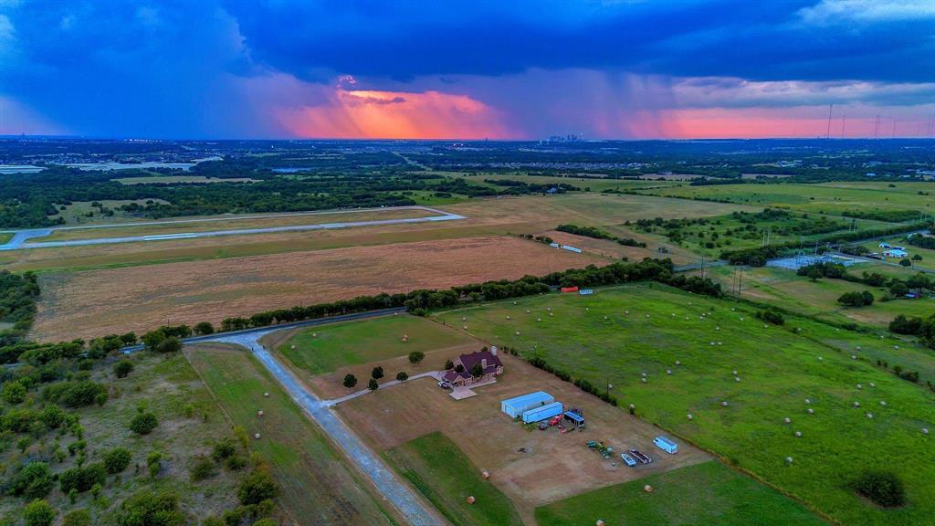 1810 Longbranch Road Waxahachie, TX 76065 - Photo 37 of 39 a view of a lake with a big yard