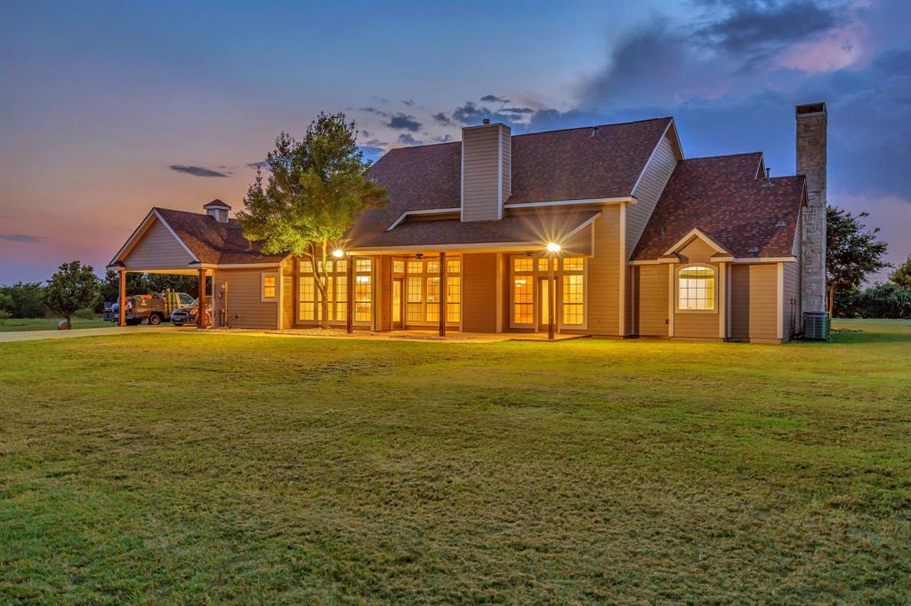 1810 Longbranch Road Waxahachie, TX 76065 - Photo 5 of 39 a front view of house with yard and ocean view