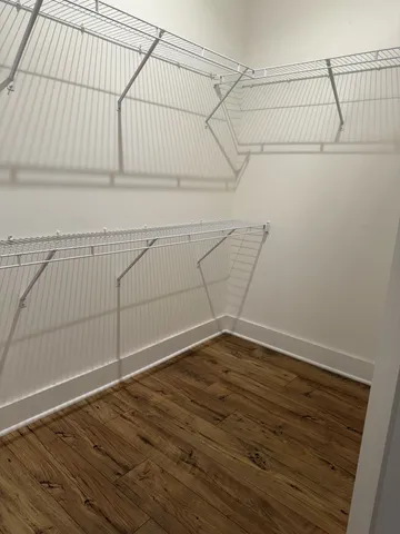 a view of a room with racks on the wall