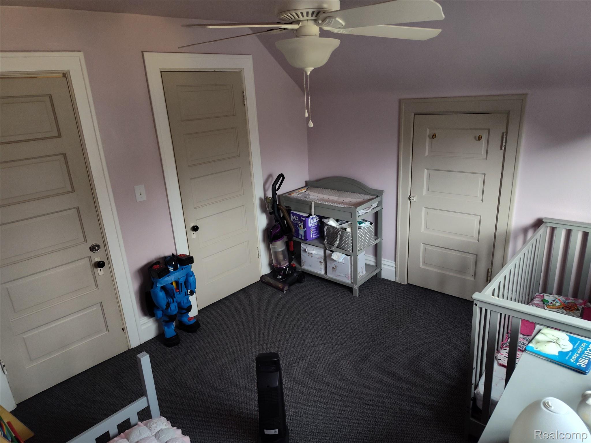635 Laplaisance Road Monroe, MI 48161 - Photo 14 of 23 Carpeted bedroom featuring a ceiling fan