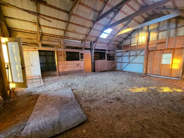 a view of a room with wooden walls