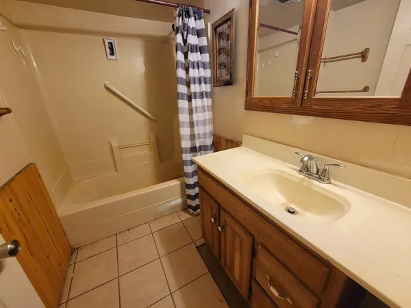 a bathroom with a sink and a bathtub