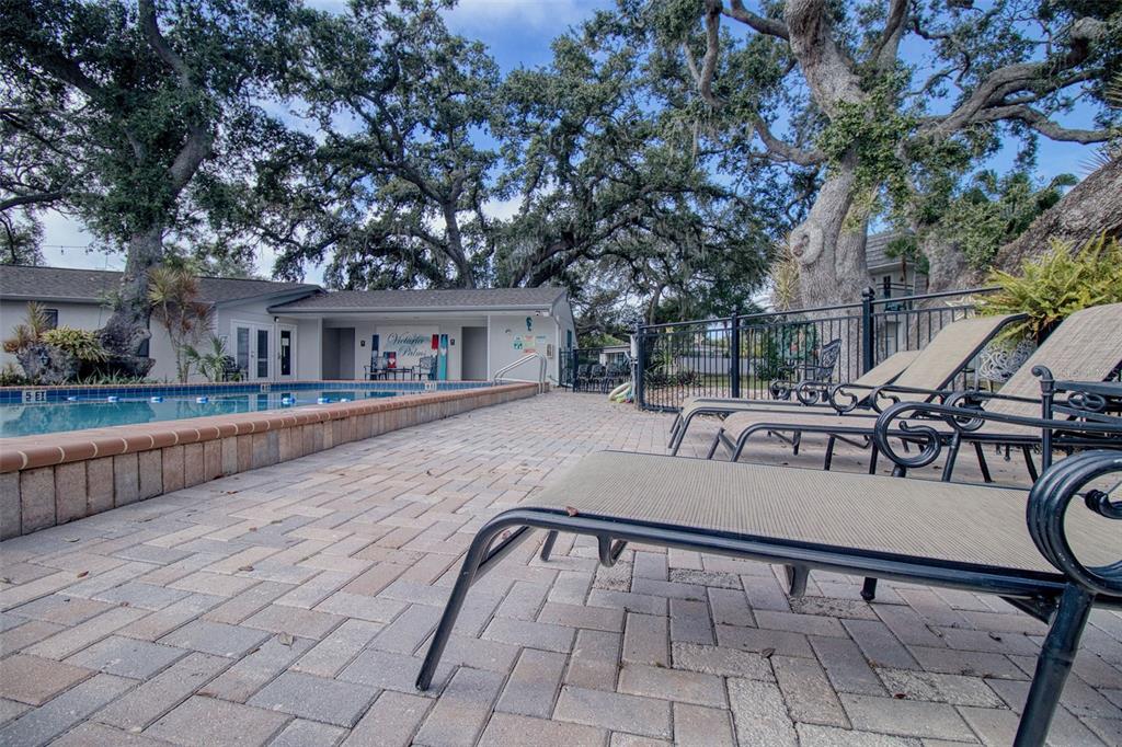702 Lyndhurst Street, Unit 821 Dunedin, FL 34698 - Photo 23 of 30 a view of house with deck and outdoor seating