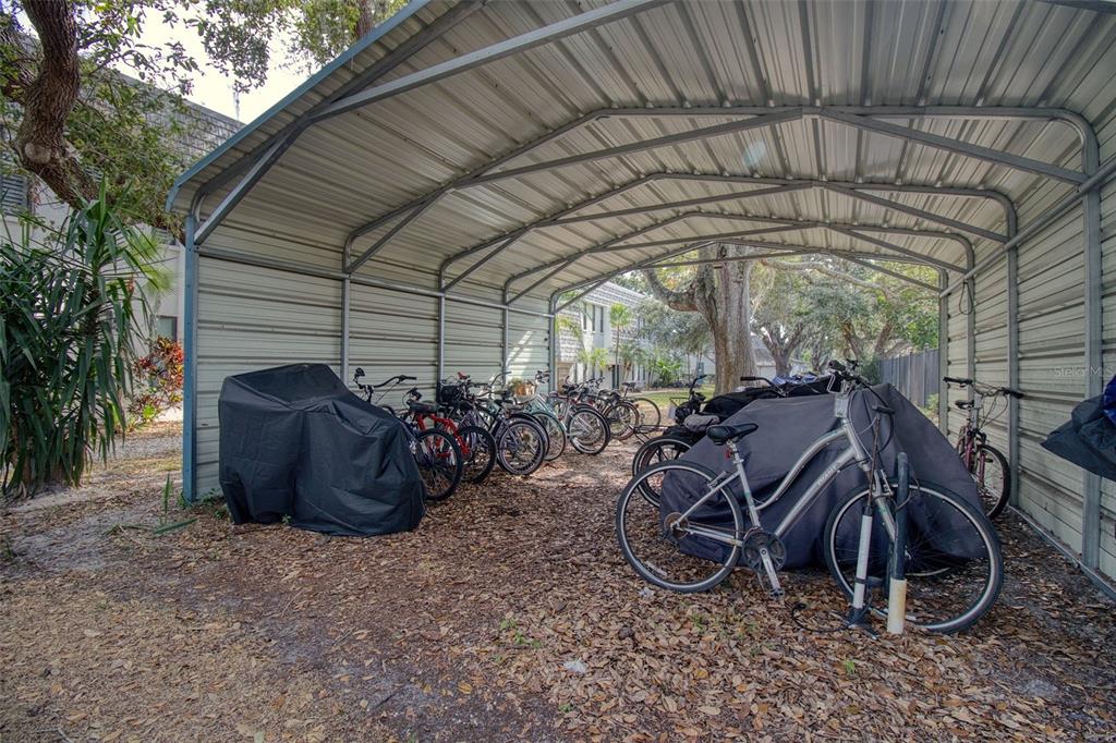 702 Lyndhurst Street, Unit 821 Dunedin, FL 34698 - Photo 26 of 30 a view of an chairs and table in the patio