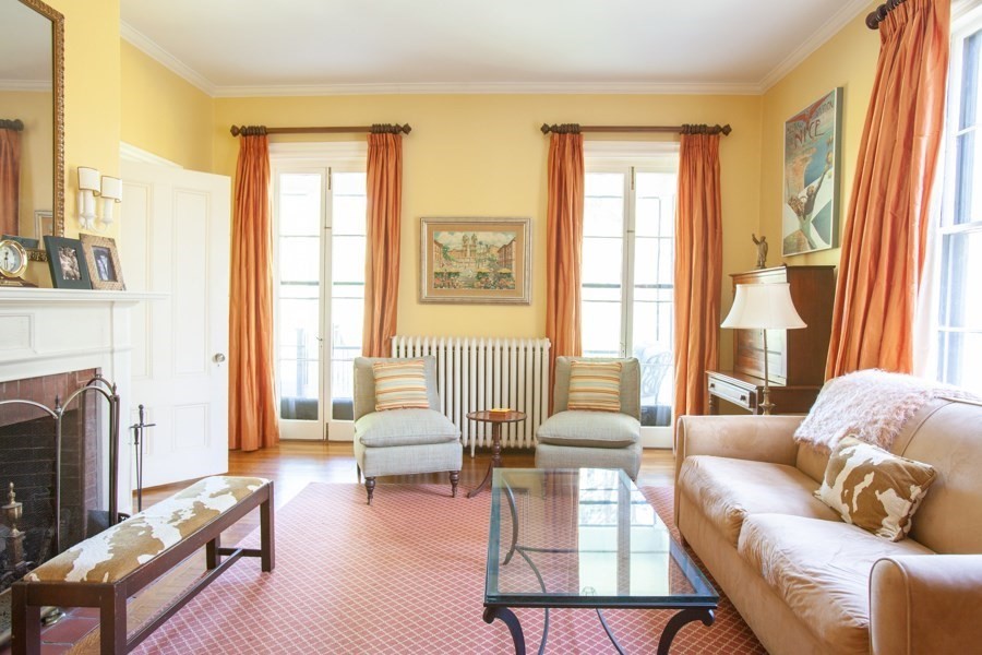 62 Pond Road Wellesley, MA 02482 - Photo 5 of 14 a living room with furniture and a fireplace