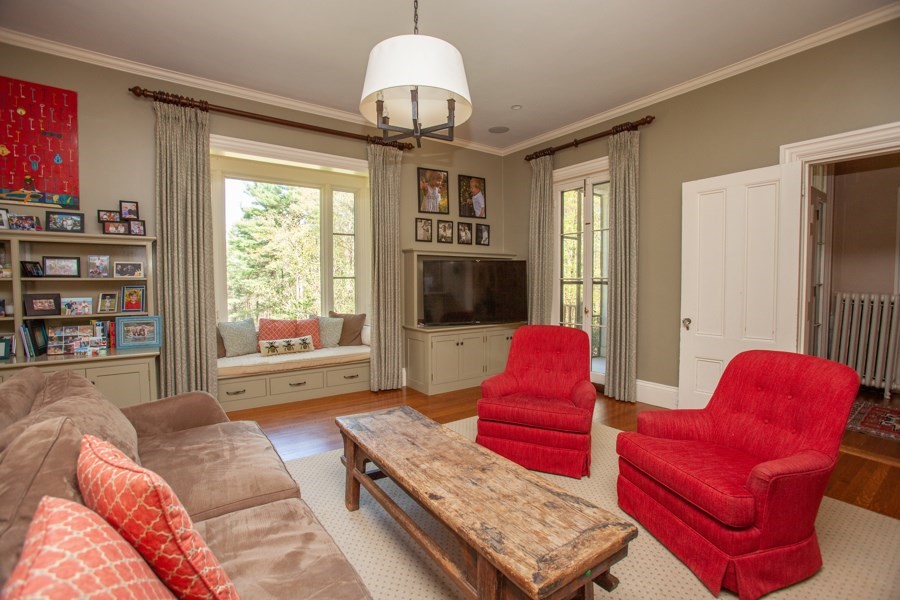 62 Pond Road Wellesley, MA 02482 - Photo 8 of 14 a living room with furniture or flat screen tv and a large window