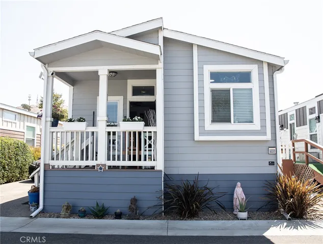 a front view of a house with balcony