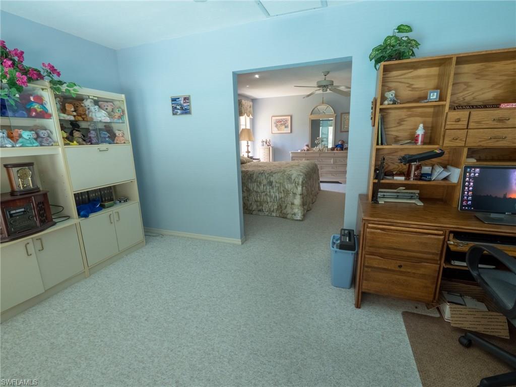 501 Springline Drive Naples, FL 34102 - Photo 10 of 14 a room with storage and utility