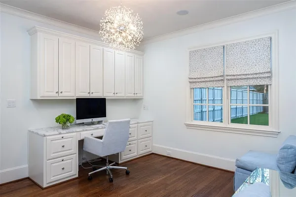 a workspace with furniture and window