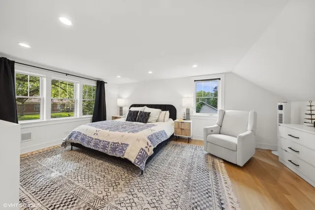 a bathroom with a shower sink and mirror