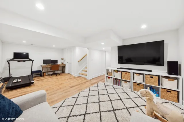 a utility room with sink dryer and washer