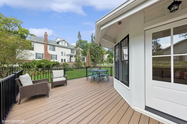 a spacious bedroom with a bed and a couch