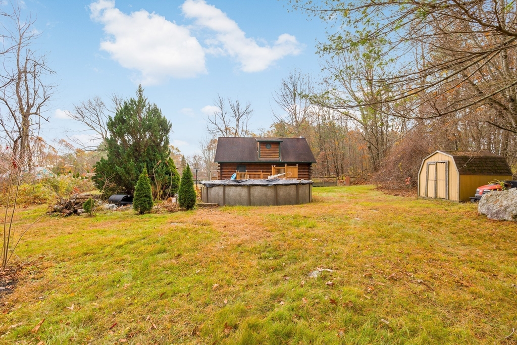 404 Rawson Street, Unit 404 Leicester, MA 01524 - Photo 6 of 13 a house view with swimming pool in front of house