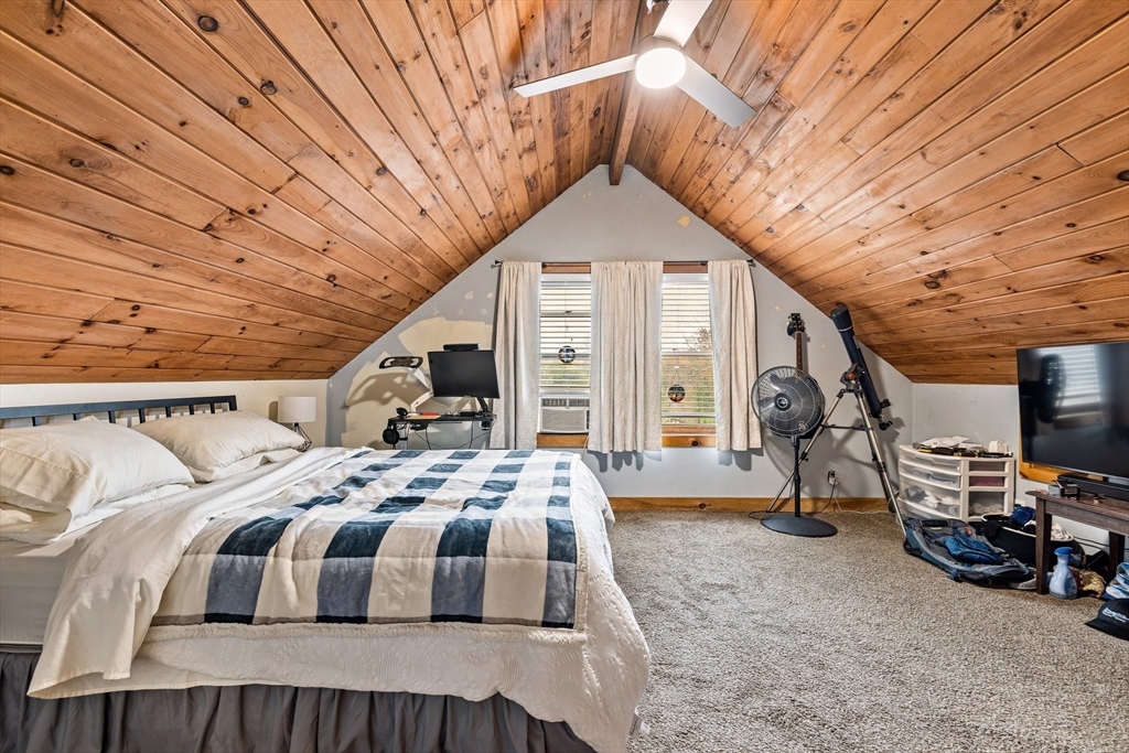 404 Rawson Street, Unit 404 Leicester, MA 01524 - Photo 10 of 13 a front view of a house with parking area