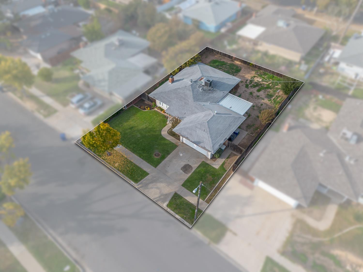 2999 East Richert Avenue Fresno, CA 93726 - Photo 14 of 19 an aerial view of house with yard