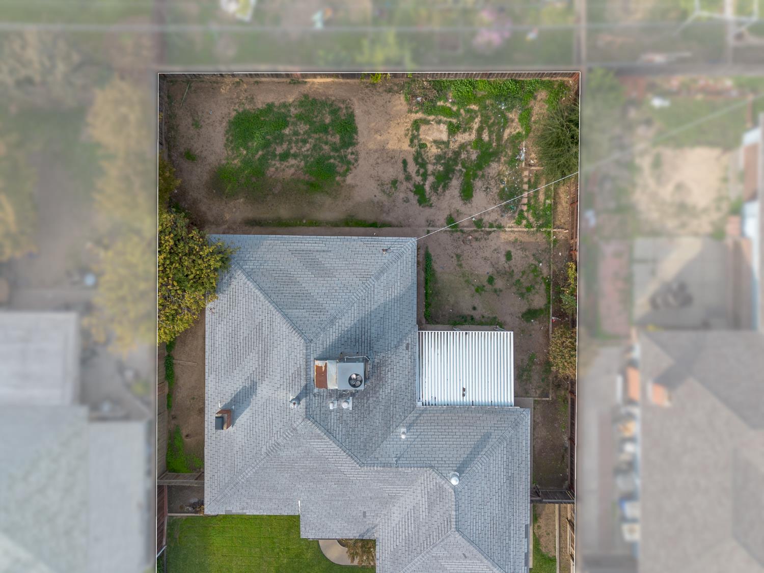 2999 East Richert Avenue Fresno, CA 93726 - Photo 18 of 19 an aerial view of a house with a yard