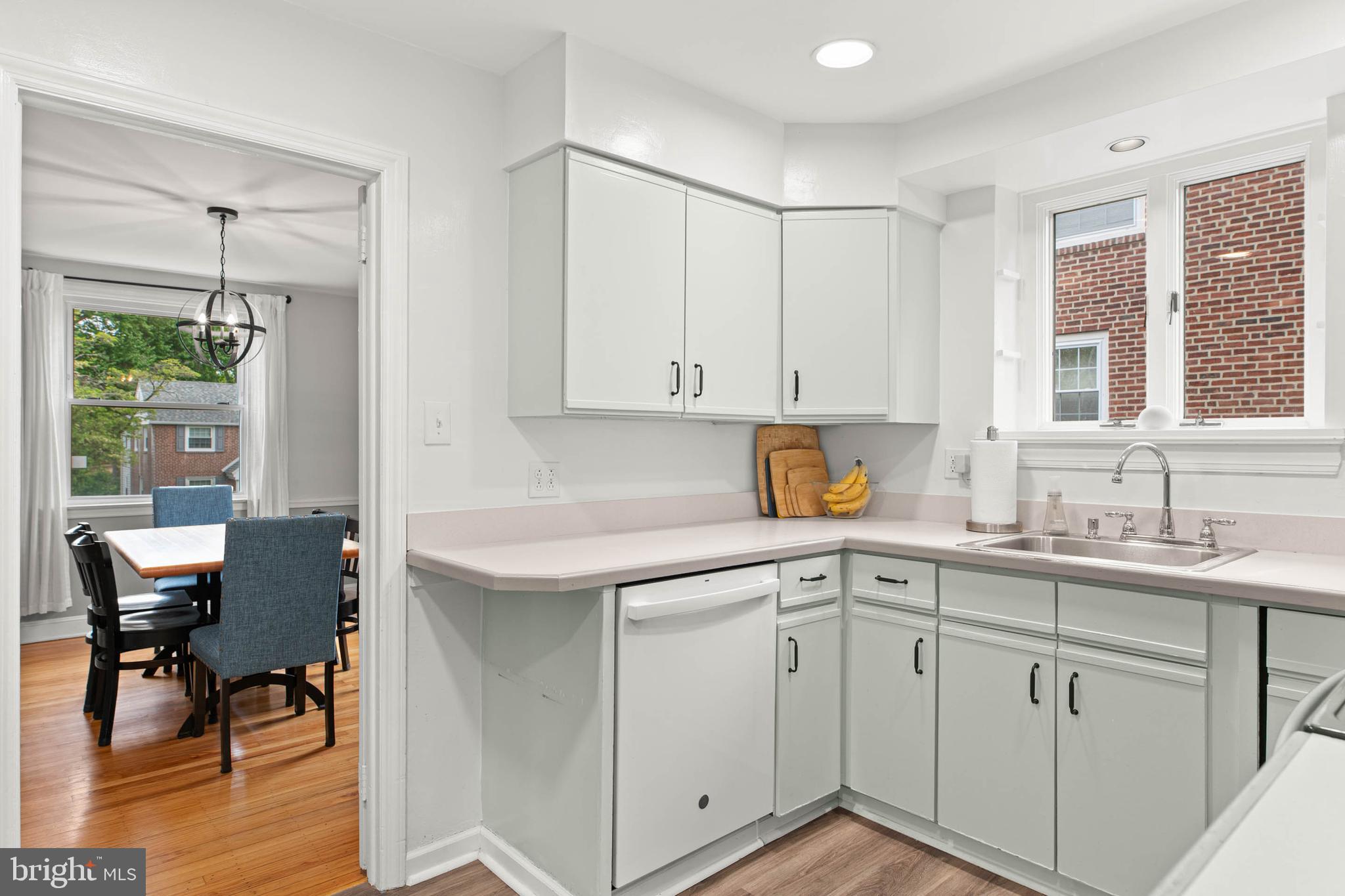 465 Briarhill Road Springfield, PA 19064 - Photo 11 of 51 a kitchen with a sink cabinets and window