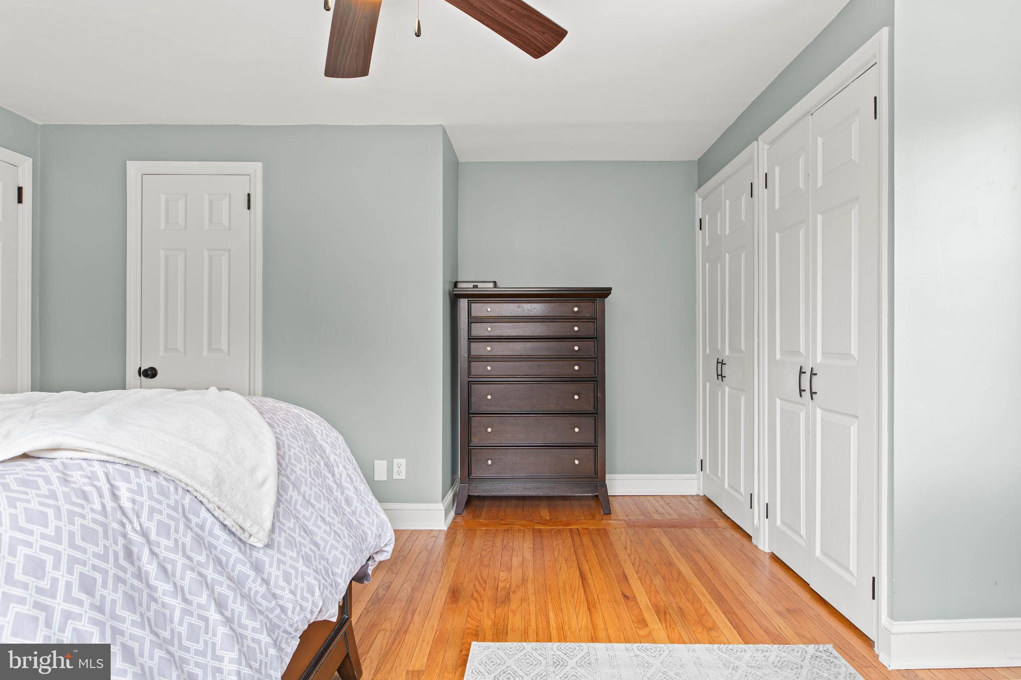 465 Briarhill Road Springfield, PA 19064 - Photo 31 of 51 a bedroom with a bed and a walk in closet