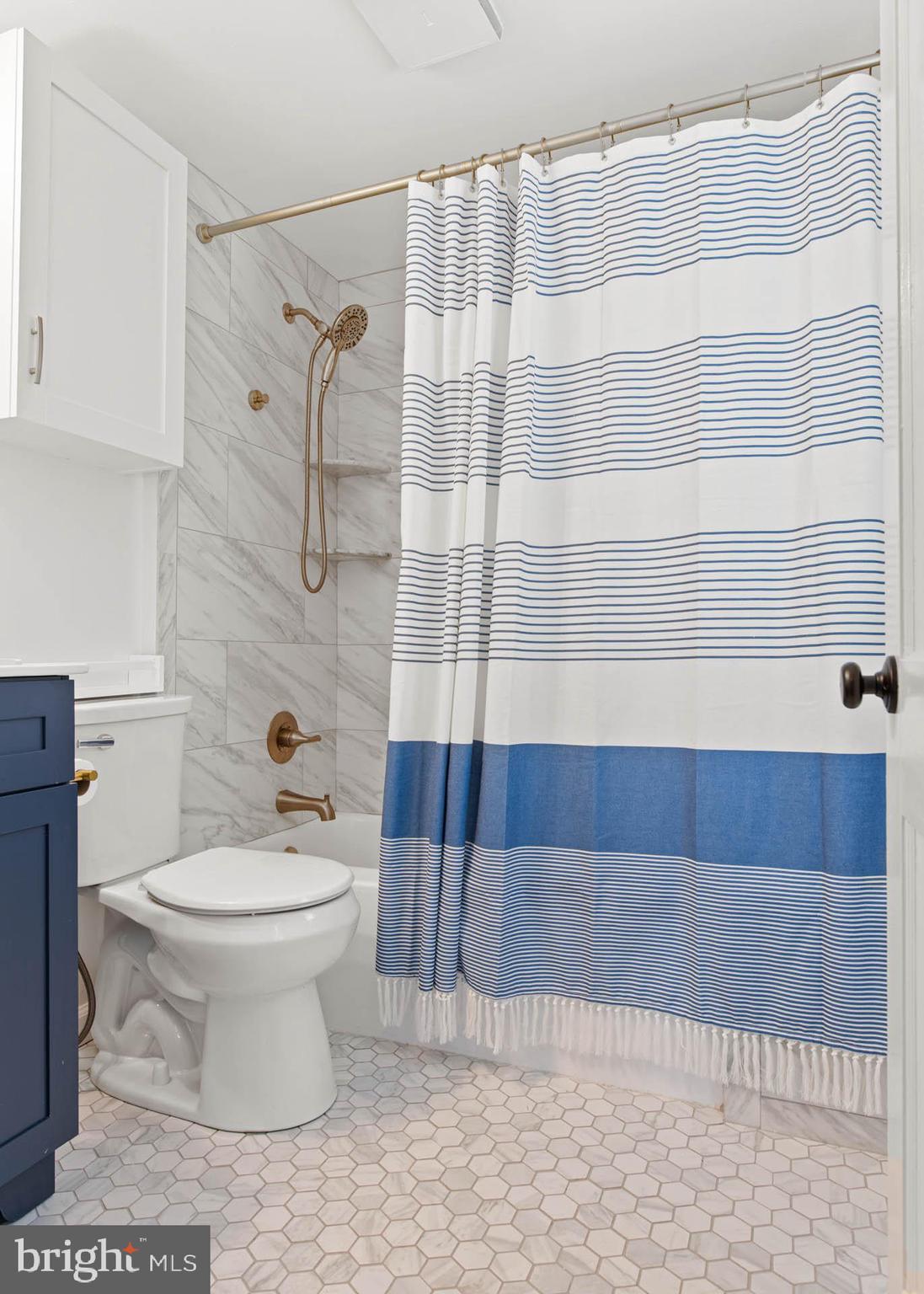 465 Briarhill Road Springfield, PA 19064 - Photo 38 of 51 a bathroom with a toilet and a shower