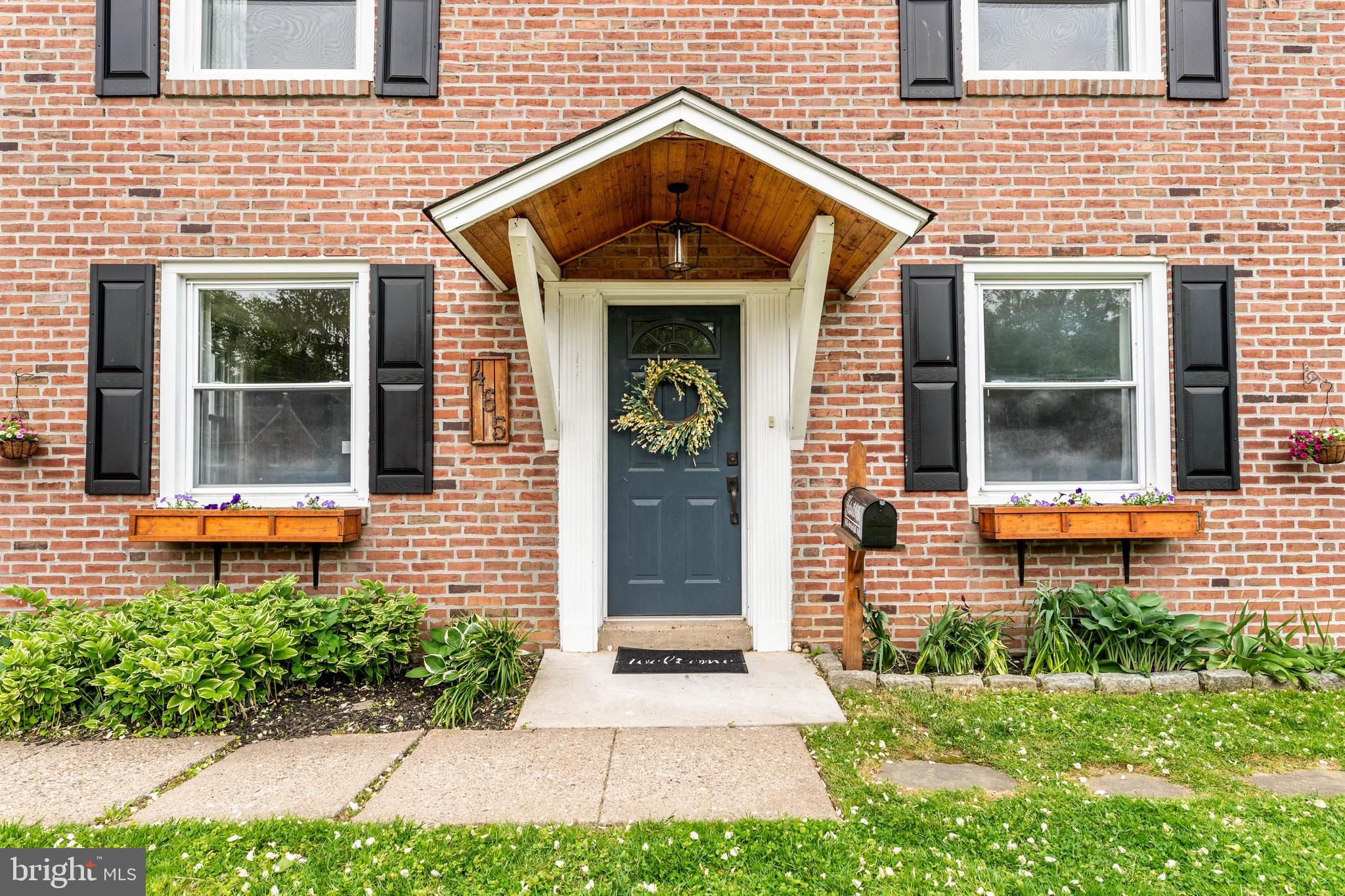 465 Briarhill Road Springfield, PA 19064 - Photo 51 of 51 a front view of a house with garden
