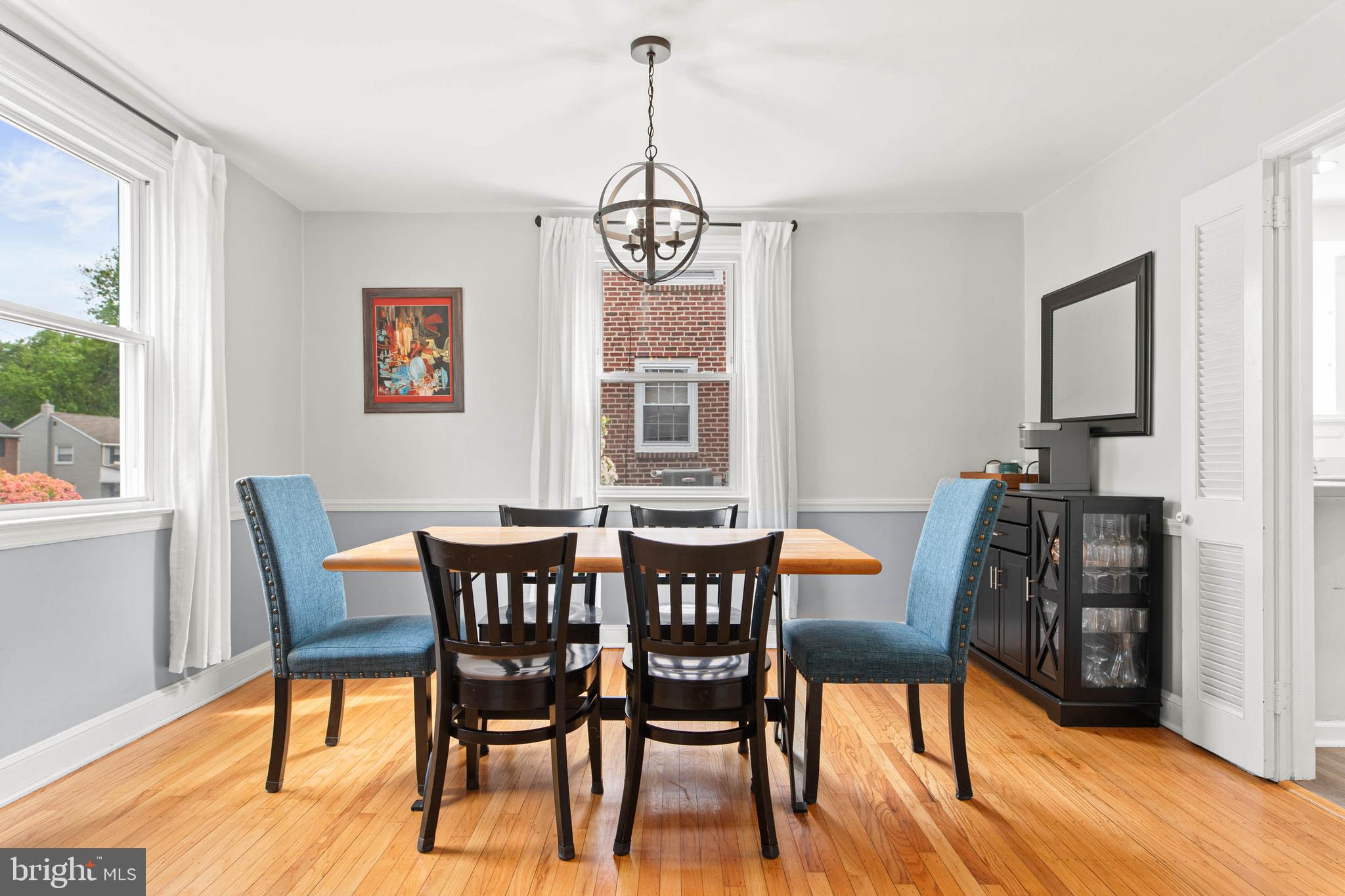 465 Briarhill Road Springfield, PA 19064 - Photo 8 of 51 a view of a dining room with furniture window and wooden floor