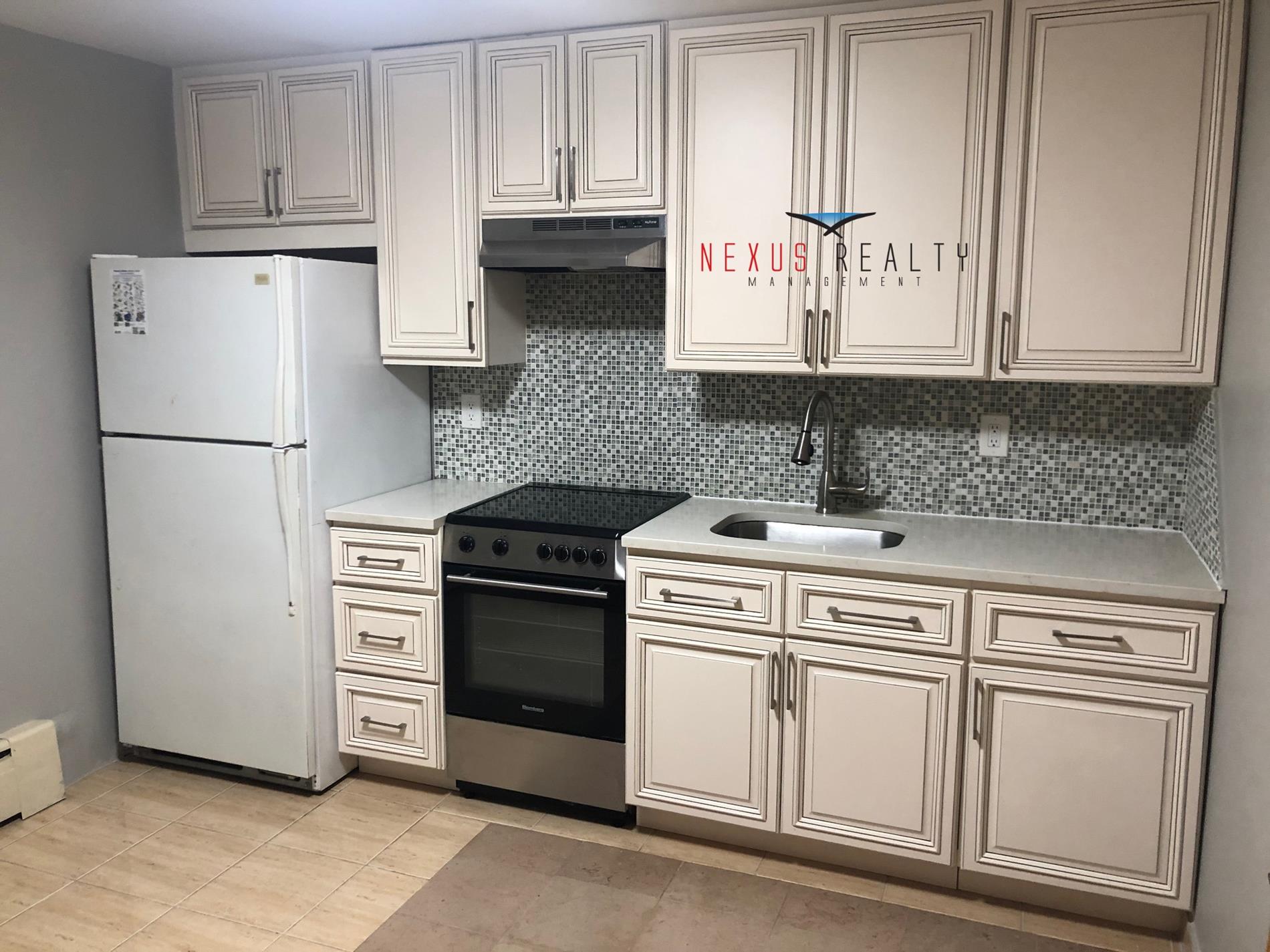 19-22 21st Road, Unit BSMT Queens, NY 11105 - Photo 1 of 10