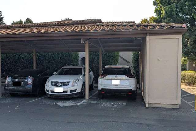 a car parked in front of a house