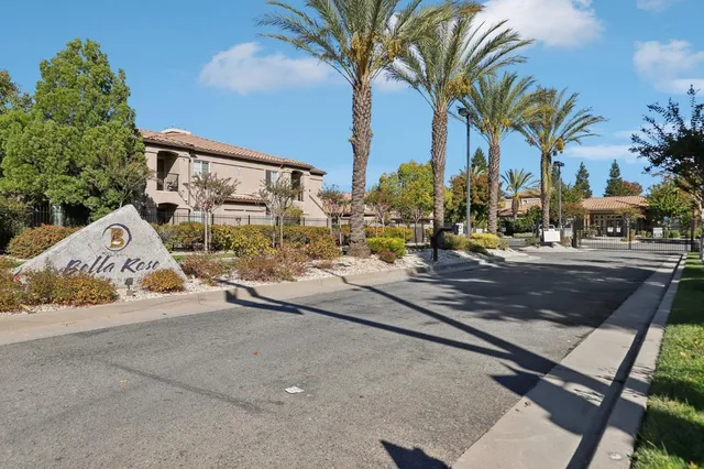 a view of a yard with cars