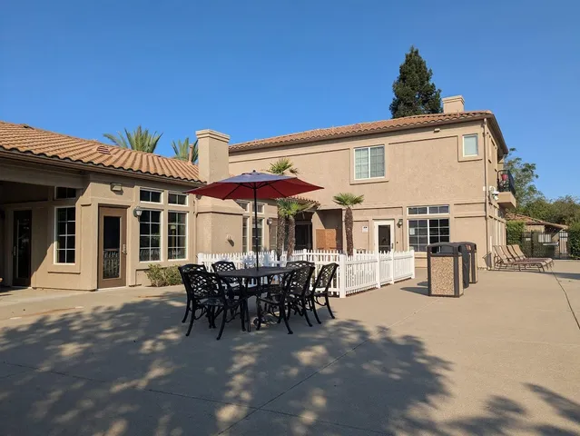 a view of a house with patio