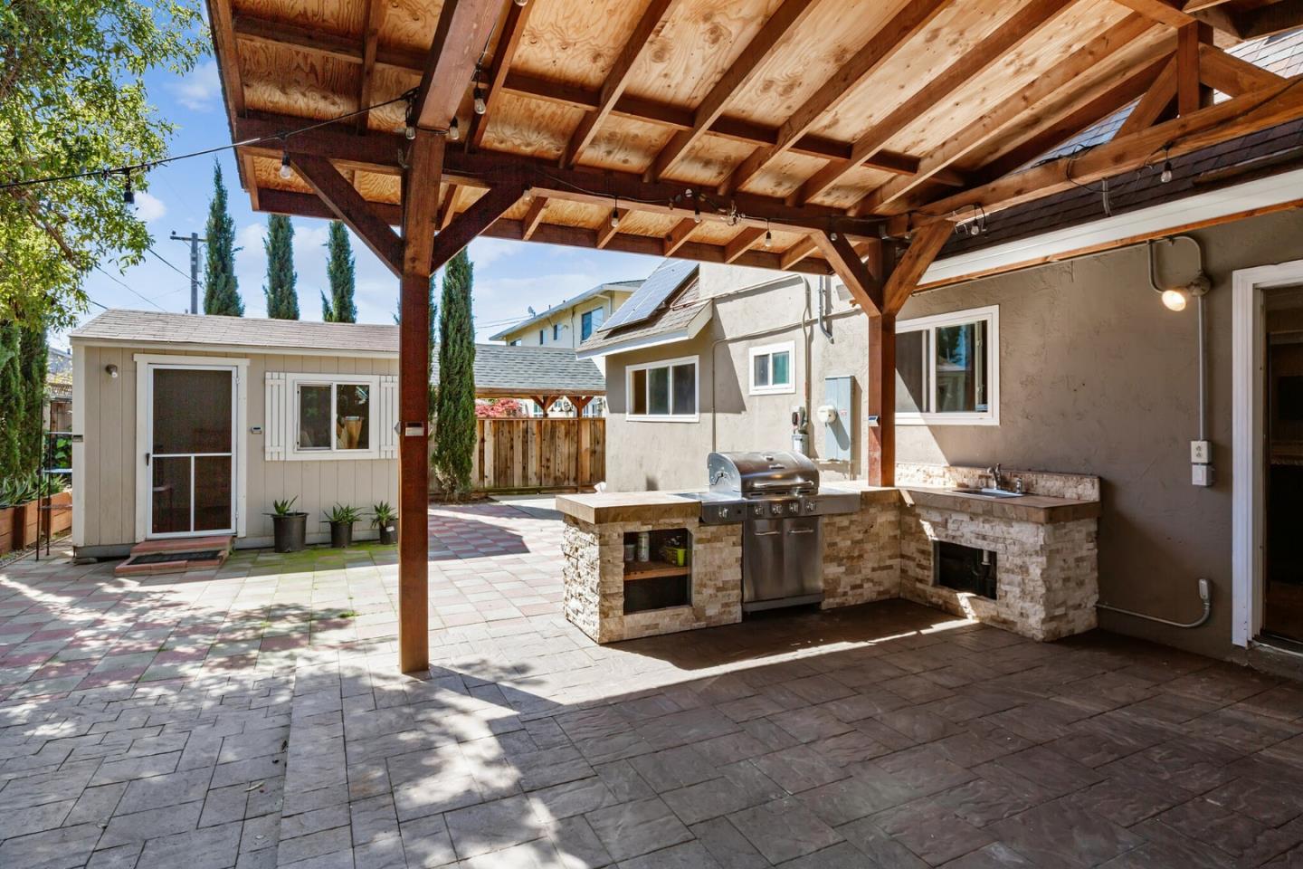 1430 Olympic Drive Milpitas, CA 95035 - Photo 18 of 21 a view of a porch with furniture and a fire pit