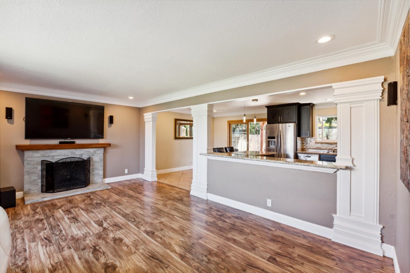1430 Olympic Drive Milpitas, CA 95035 - Photo 4 of 21 a living room with furniture and a fireplace