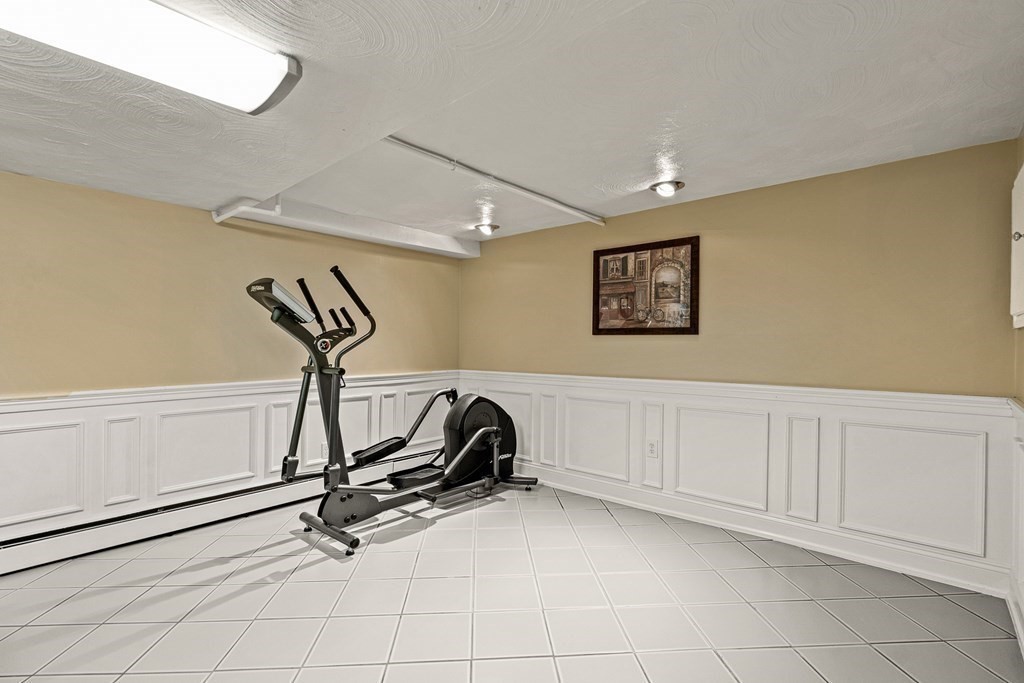23 Webster Road Lexington, MA 02421 - Photo 19 of 32 a view of a room with gym equipment