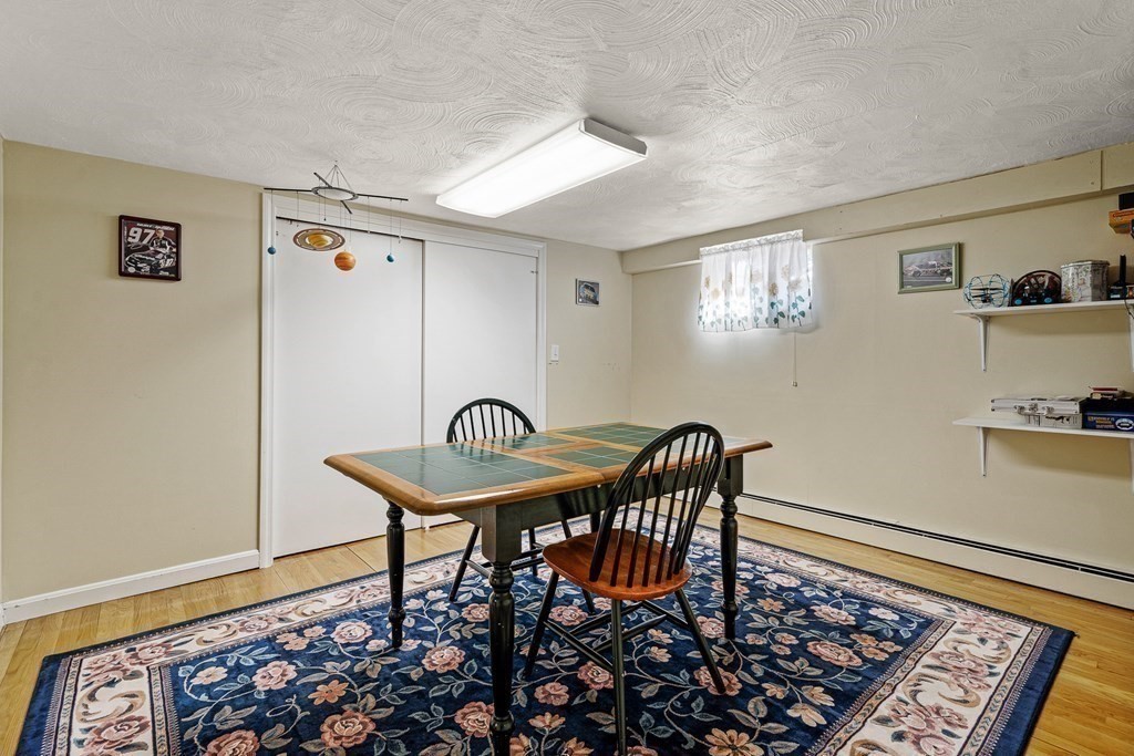 23 Webster Road Lexington, MA 02421 - Photo 24 of 32 a room with furniture and window