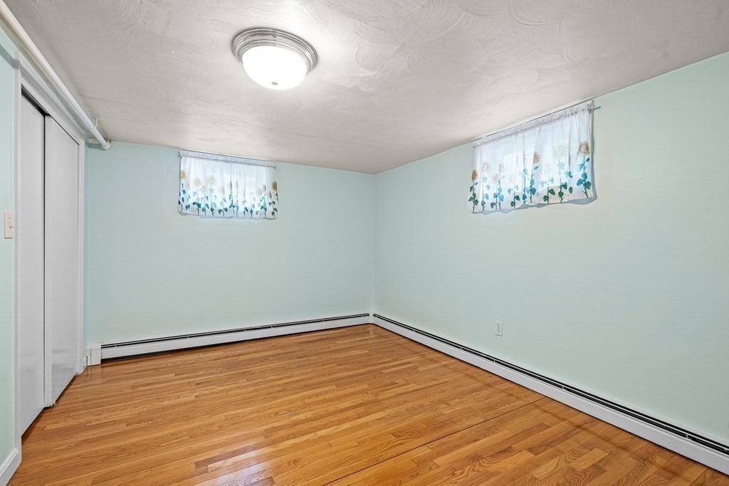 23 Webster Road Lexington, MA 02421 - Photo 25 of 32 an empty room with a window