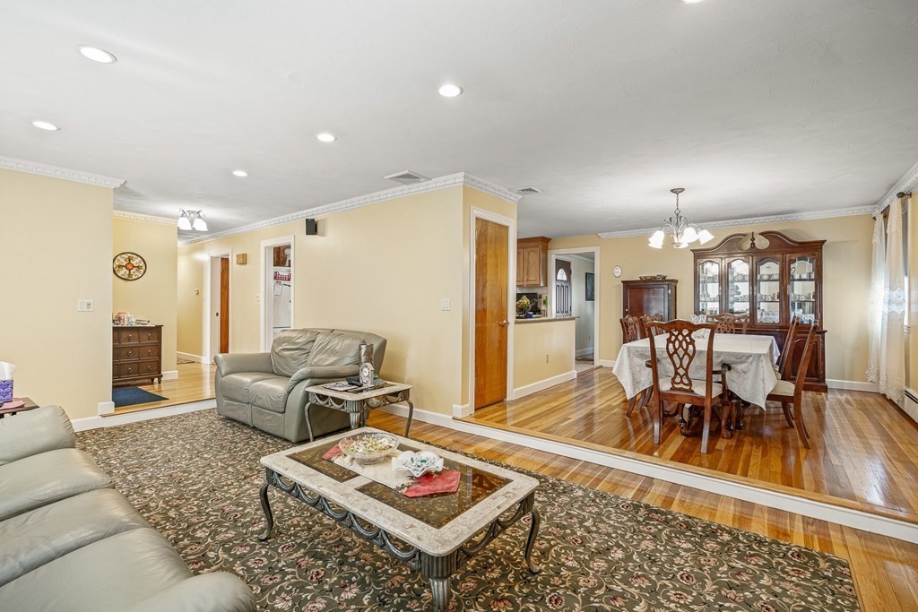23 Webster Road Lexington, MA 02421 - Photo 5 of 32 a living room with furniture and a table