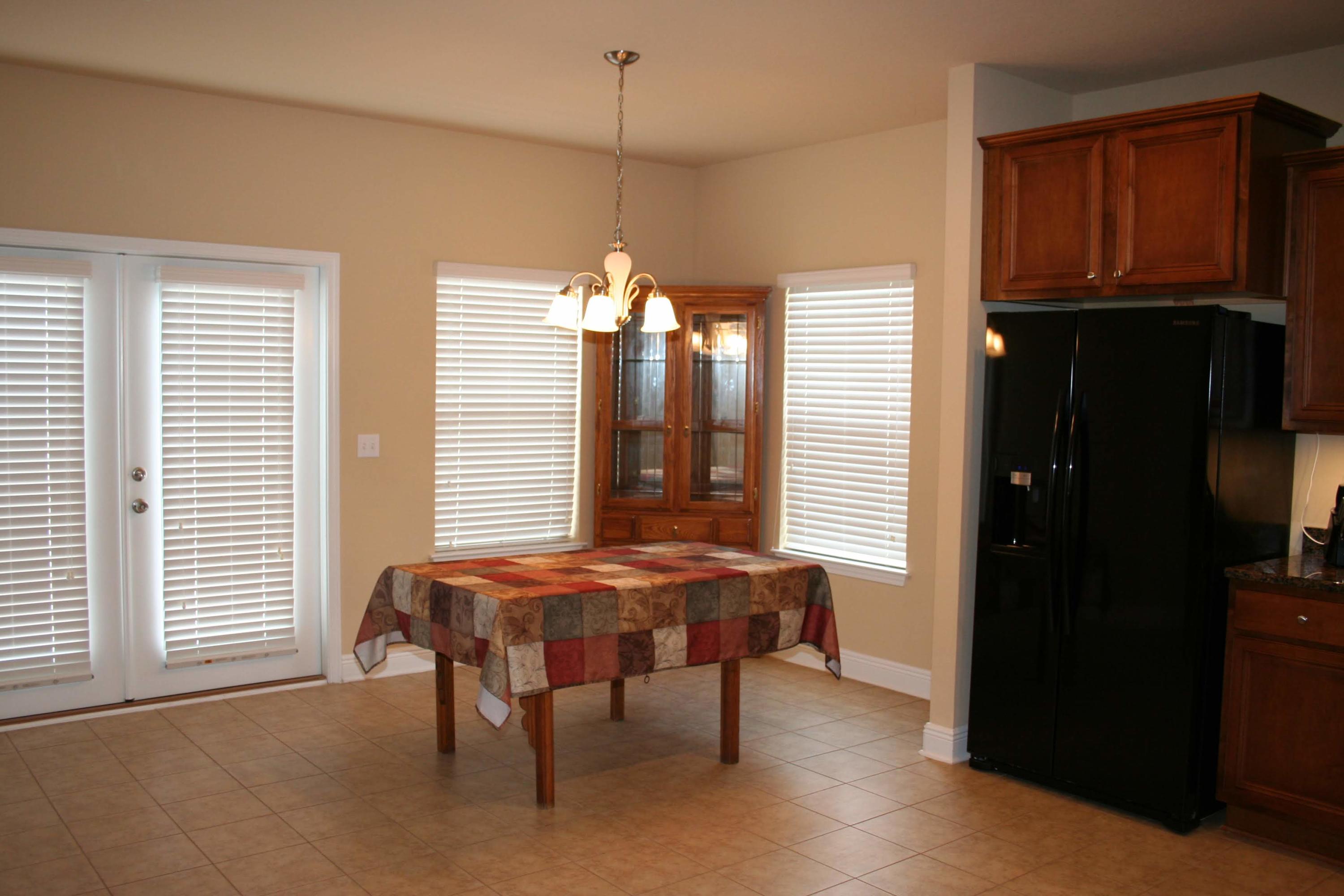 652 Red Fern Road Crestview, FL 32536 - Photo 7 of 32 a bedroom with furniture and a window