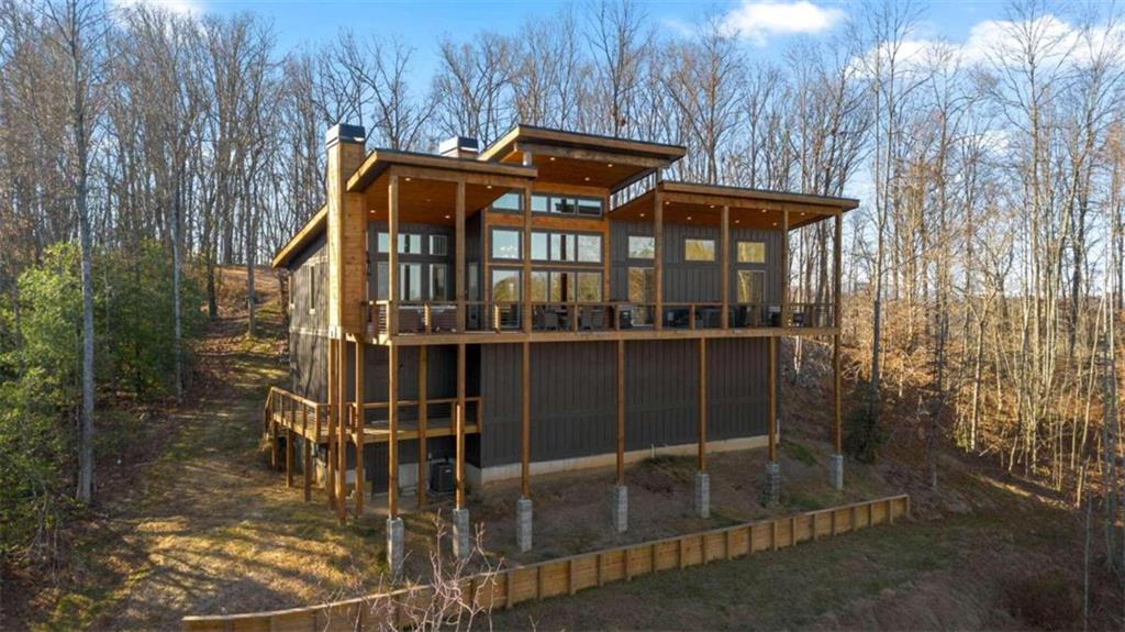 384 Weaver Creek Road Blue Ridge, GA 30513 - Photo 1 of 1 a view of a house with a door