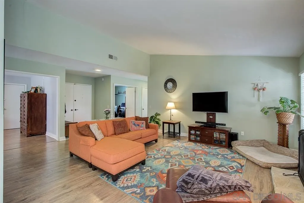 3577 Ridge Road Oceanside, CA 92056 - Photo 3 of 22 a living room with furniture and a flat screen tv
