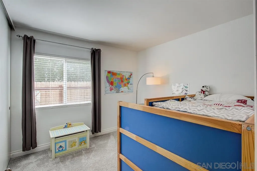 3577 Ridge Road Oceanside, CA 92056 - Photo 10 of 22 a room with a bed and a window