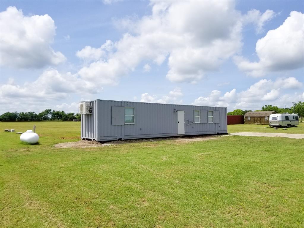 350 Summerfield Court Springtown, TX 76082 - Photo 12 of 20 a view of a house with backyard