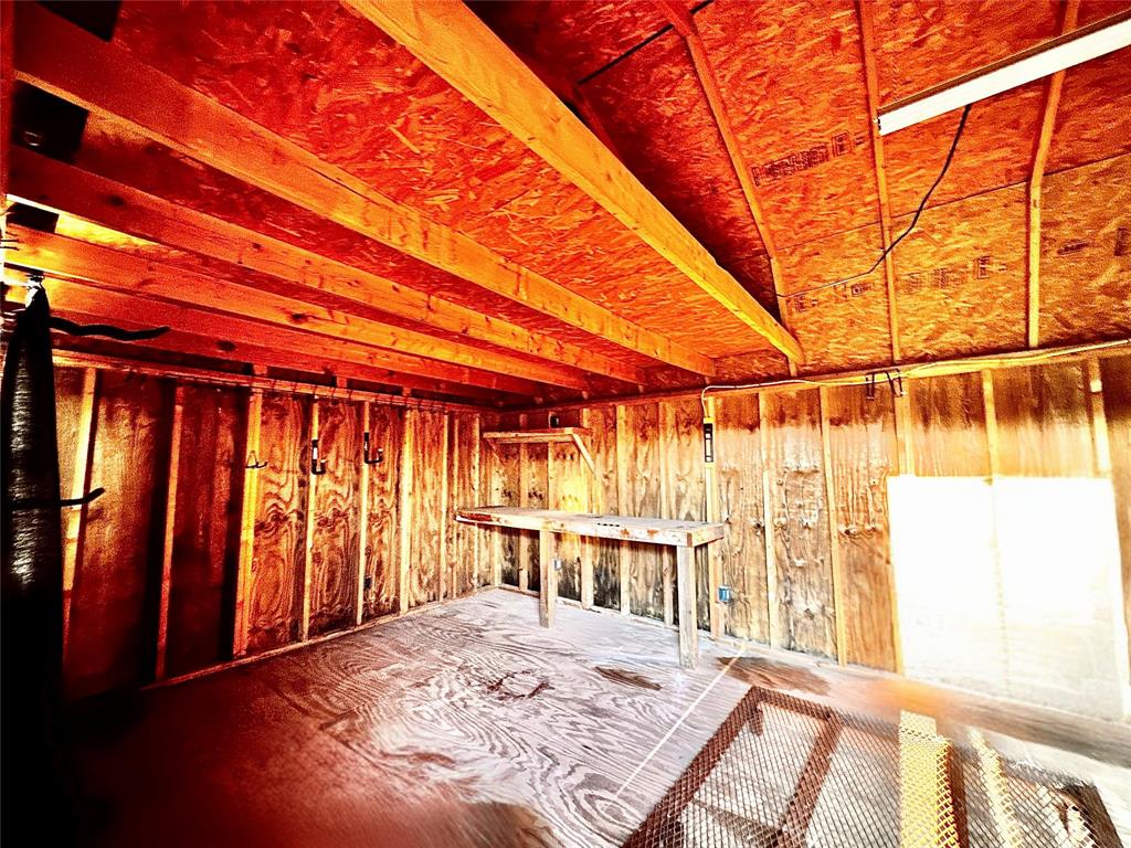 350 Summerfield Court Springtown, TX 76082 - Photo 16 of 20 a view of a backyard with wooden floor and a tub