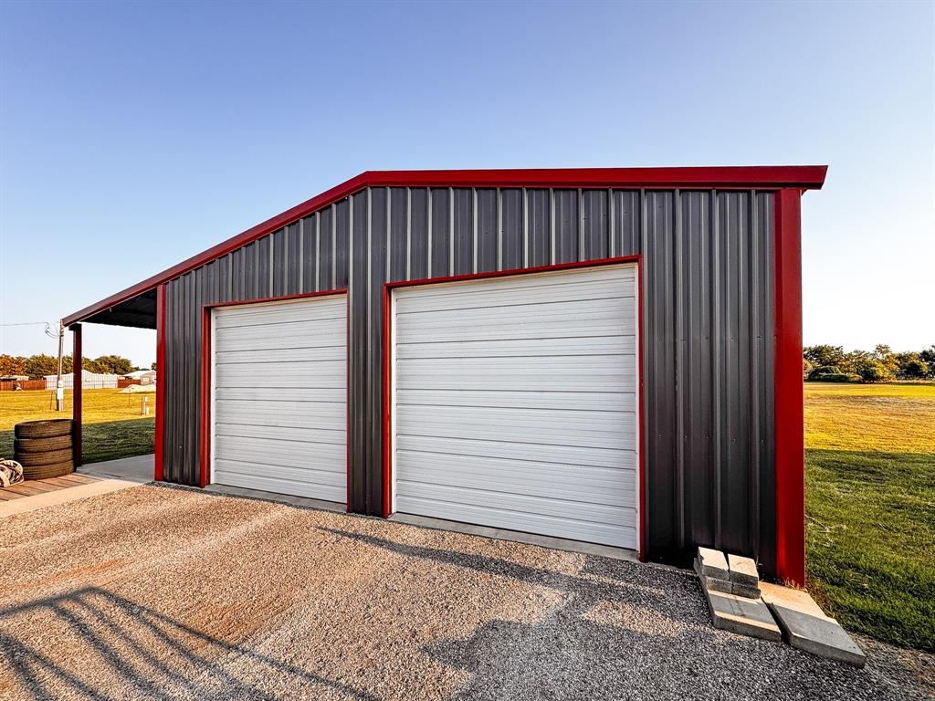 350 Summerfield Court Springtown, TX 76082 - Photo 3 of 20 a view of a house with a backyard