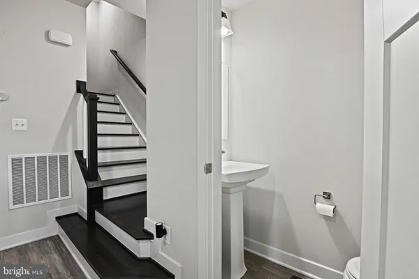 a view of entryway with wooden floor