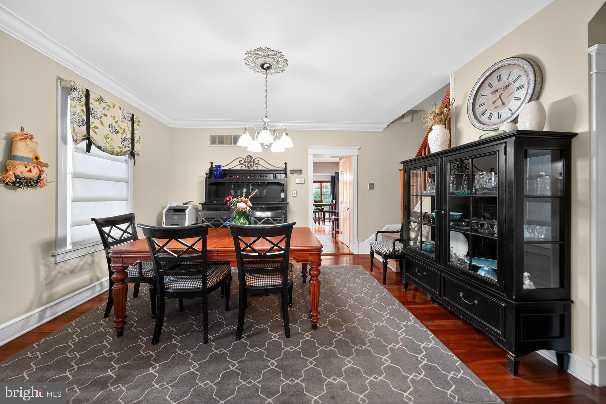 526 East Main Street Moorestown, NJ 08057 - Photo 8 of 49 a dining room with furniture a chandelier and wooden floor