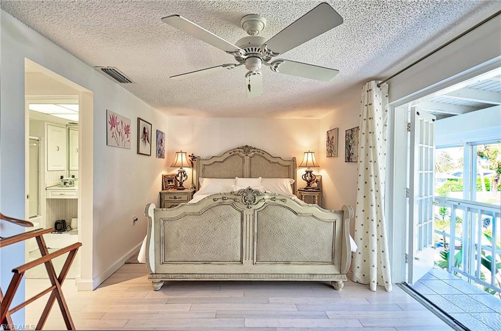 14 Watercolor Way, Unit 14 Naples, FL 34113 - Photo 18 of 28 a view of entryway with wooden floor