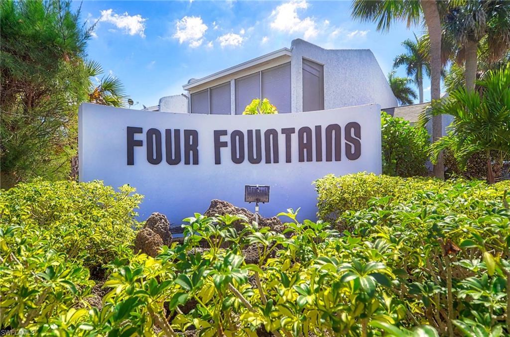 14 Watercolor Way, Unit 14 Naples, FL 34113 - Photo 24 of 28 a view of a house with balcony and garden